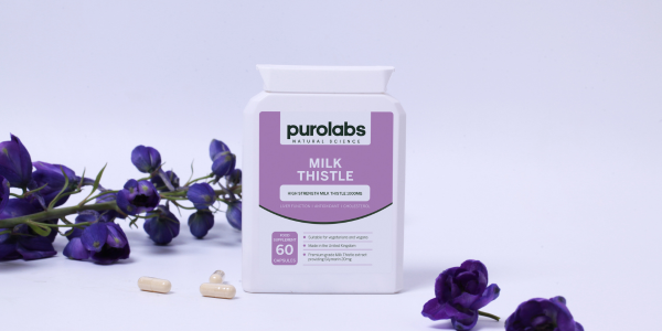A bottle of Purolabs milk thistle next to purple flowers.