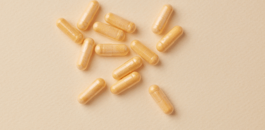 A group of pills sitting on top of a table.