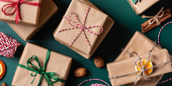 Presents wrapped in brown paper and tied with twine.